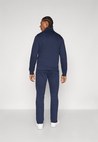 Champion Melegítő - navy