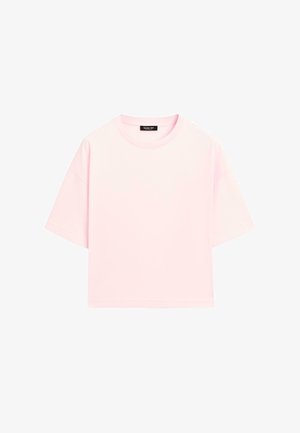 Short-sleeve t-shirt made of lightweight cotton, featuring a round neck in soft pastel pink with a relaxed fit and stitched hem.