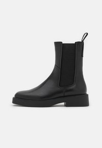 Vagabond Kotníkové boty na platformě - black