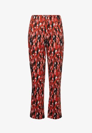 Rode en zwarte gestreepte leggings met een elastische tailleband, featuring een mix van verticale en horizontale kwaststreken. Gladde textuur.