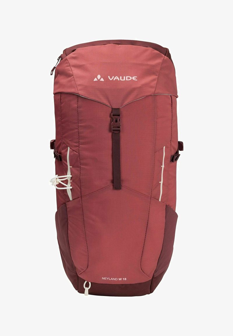 Sac à dos en nylon rouge avec plusieurs compartiments, poignée supérieure simple, bretelles réglables et poche en maille sur le côté pour le matériel. Étiquette de la marque présente.