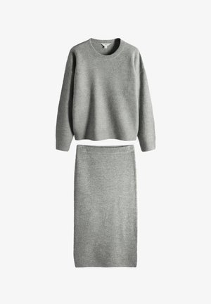 Halli kootud kampsuni ja sobiva seelikukomplekt, millel on ümara kaelusega, soonikkoes mansetid ja pehme tekstuur. Lihtne, minimalistlik disain.