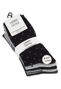 Fünf Paar Damen Baumwollsocken in Schwarz und Grau, mit Punkten und einer glatten Textur, verpackt mit einem Etikett, das Größe und Preis anzeigt.