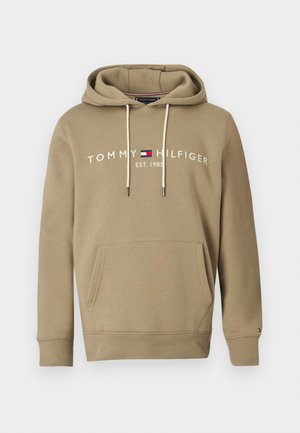 Sudadera con capucha beige de tejido suave, con bolsillo canguro, capucha con cordón y logo impreso "TOMMY HILFIGER EST. 1985" en blanco.