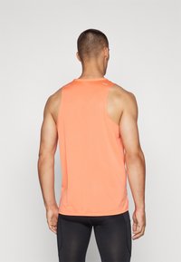 Nike Performance RISE TANK - Top - light wild mango/reflective silver