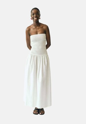 STRAPLESS - Maxi dress - off white
