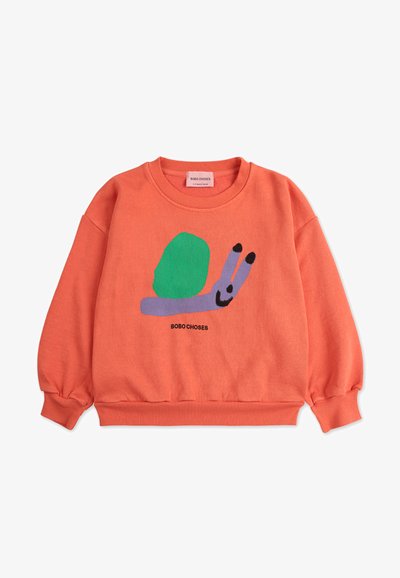 Orange sweatshirt made of cotton, featuring a snail design in green, purple, and black. Elasticized cuffs and hem. Brand label displayed.