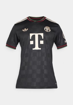 Black athletic jersey made of smooth fabric. Features white and red accents, a round neck with a textured pattern, and logo patches on sleeves.
