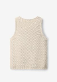 Knitted sleeveless top in light beige. Features a textured stitch pattern, round neckline, and clean edges. No visible fastenings.