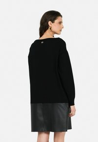 LIU JO KURZES - Abito in maglia - black