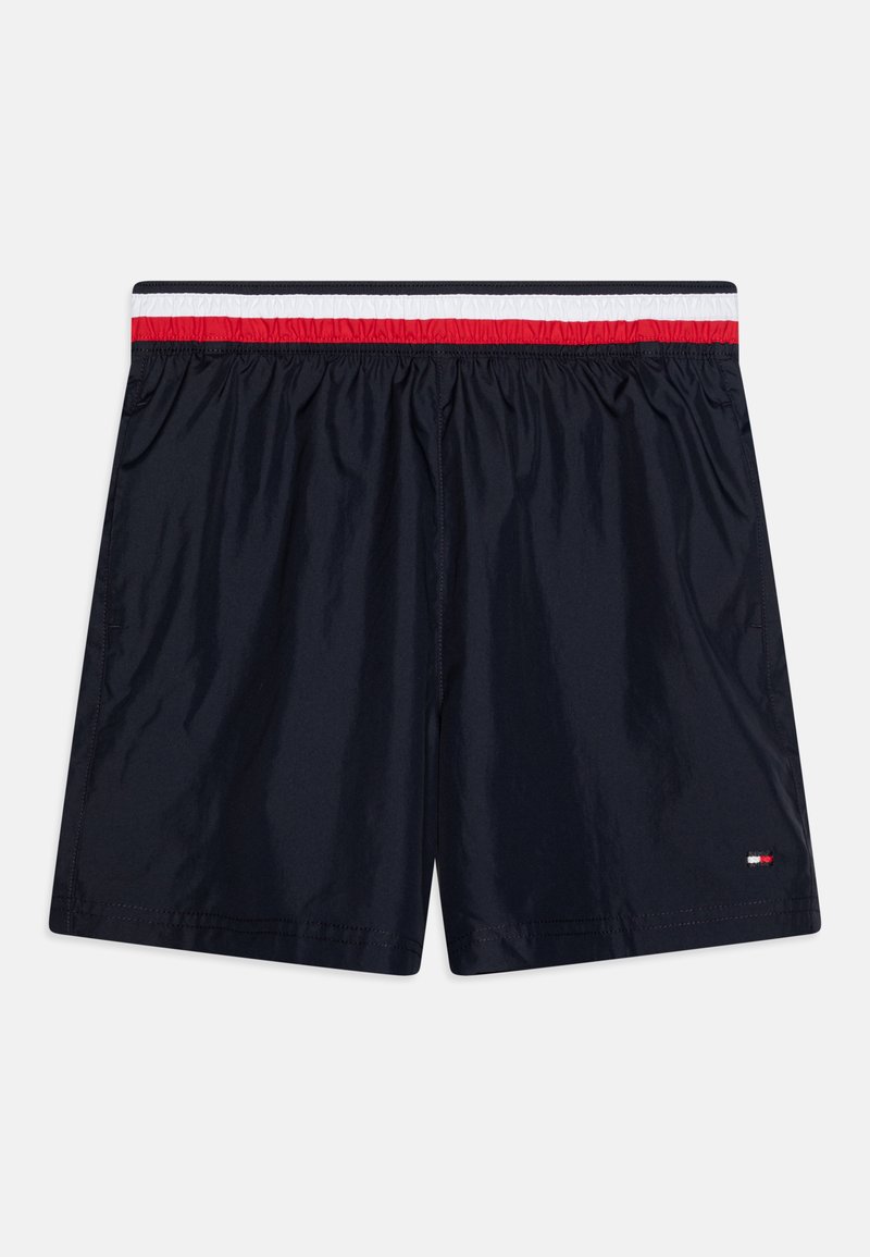 Navy swim shorts made of lightweight material, featuring an elastic waistband with red and white stripes and a small logo detail on the side.