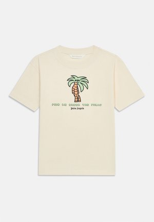 T-shirt crème à manches courtes avec un palmier cartoon portant des lunettes de soleil et le texte "Find me under the palms" et "Palm Angels" en dessous.