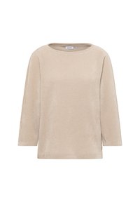 Pull en beige clair avec des manches trois quarts, col rond, tissu texturé, fentes sur les côtés et une petite étiquette de marque sur l'ourlet inférieur.