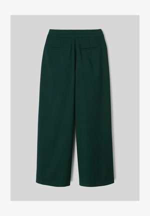 Pantalon large vert foncé taille haute avec deux poches passepoilées à l’arrière, présenté sur un fond gris clair.