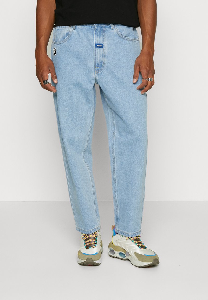 AAPE By A Bathing Ape PANTS - Jeans Relaxed Fit - bleached denim 