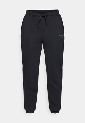 Black sweatpants in a soft, cotton blend fabric. Features an elastic waistband with drawstring, side pockets, and ribbed cuffs.