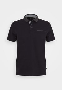 Černá polo košile s krátkými rukávy, zapínáním na knoflíky a vzorovaným límcem. Obsahuje přední kapsu s detaily. Hladký povrch.