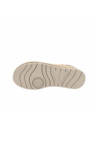 Suola della scarpa realizzata in un materiale gommoso beige chiaro, con un motivo di battistrada ondulato. Il marchio è impresso al centro.