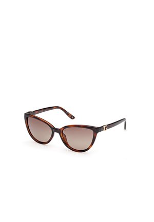 Cat-eye sunglasses with a tortoiseshell pattern, brown gradient lenses, and gold hardware accents on the temple. Made from plastic material.