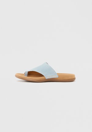 Light blue suede slipper with a tan cushioned sole and a toe loop, shown from the side on a white background.