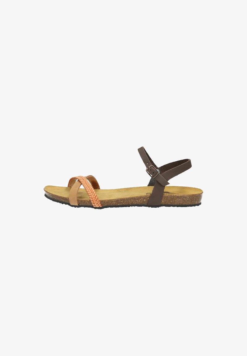 Brown and tan flat sandals featuring a braided strap, adjustable ankle strap, and a textured cork footbed with a rubber sole.