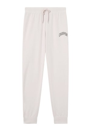 Pantaloni sportivi di colore beige chiaro con fascia elastica in vita e polsini, coulisse regolabile e logo con scritta nera "CHAMPION" sulla coscia sinistra.