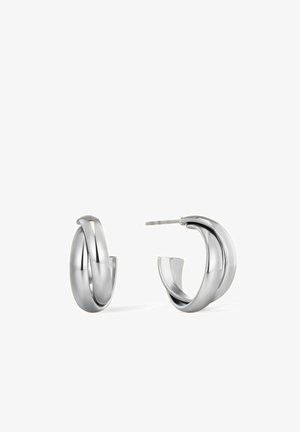 Sidabrinės klausomos auskarai su sukimosi dizainu, pagaminti iš lygaus, blizgaus metalo ir turi saugų užsegimą. Elegantiškas, minimalistinis stilius.