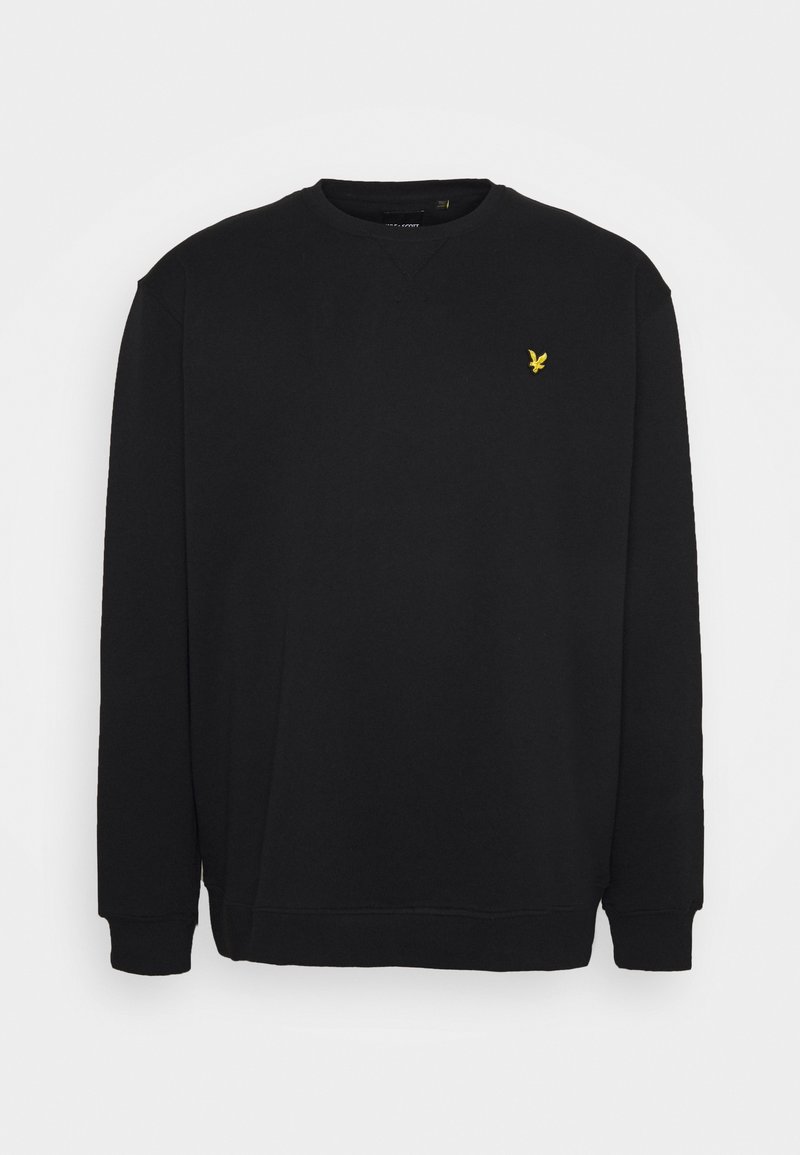 Sweat-shirt noir à manches longues avec col rond, petit logo d'oiseau jaune sur la poitrine gauche, et poignets et ourlet côtelés.