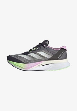 Black and gray running shoe with mesh upper, white stripes, and green/pink accents. Features midsole branding and a sleek, aerodynamic shape.