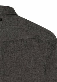 Gray, textured fabric, showing the back of a collared shirt. Features a yoke and subtle stitching details along the shoulders and collar.