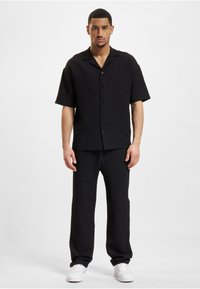 DEF PARIS - Housut - black