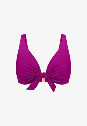 Fioletowy górny element bikini z szerokimi ramiączkami i marszczonym przodem, związany na supeł z małą złotą sprzączką na środku.