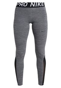 Leggings Nike Pro en tissu gris chiné, avec des accents en mesh noir sur les côtés et une taille noire avec le texte "PRO NIKE".