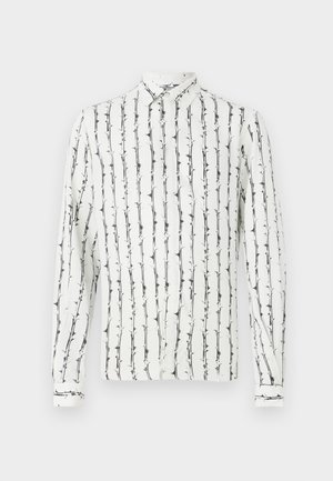 White button-up shirt featuring black vertical lines and a floral pattern. Long sleeves with buttoned cuffs. Made of a lightweight fabric.