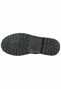 Suola di scarpa in gomma nera con un profondo motivo di battistrada, caratterizzata da forme a zigzag e blocchi per trazione e durata. Texture liscia con dettagli minimi.