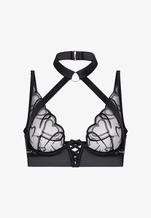 Black lace bra with heart patterns, crisscross straps, and a choker neck detail with a gold ring closure at the back.