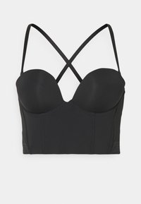 Svart bralette med formede kopper, kryssende stropper og jevn tekstur. Har en strukturert bodice og slankt design.