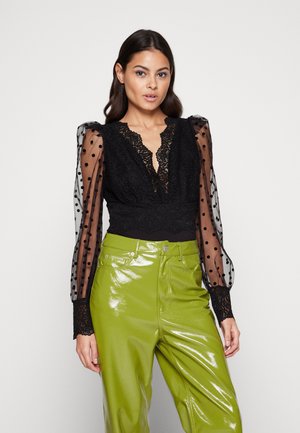 TANI - Blouse - noir