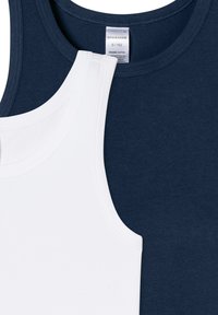 Two cotton tank tops: one navy blue and one white. Both have narrow straps and rounded necklines, with visible stitching details.