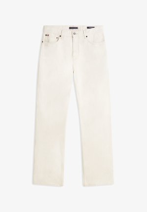 Jean en denim blanc à coupe droite. Comprend une braguette à boutons, cinq poches et des détails de couture subtils.