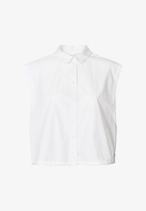 Camicia bianca senza maniche in cotone con chiusura frontale con bottoni, collo classico e forma ampia e squadrata. Presenta una texture liscia e un design minimalista.