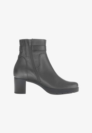 Black leather ankle boot with a round toe, side zipper, and a chunky heel. Features a smooth texture and minimalistic design accents.