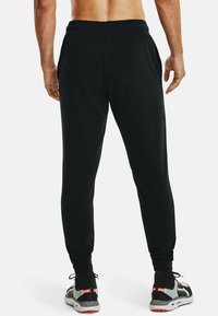 Under Armour RIVAL TERRY - Teplákové kalhoty - black