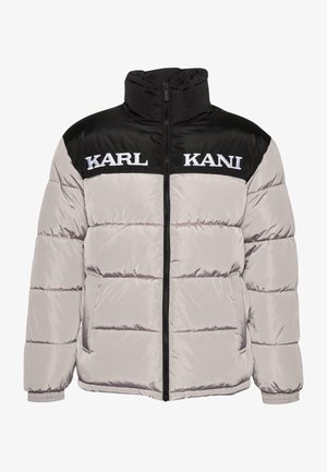 Kurtka puchowa w jasnoszarym i czarnym kolorze, z wysokim kołnierzem, zamek z przodu oraz haftowanym logo "KARL KANI" na klatce piersiowej.