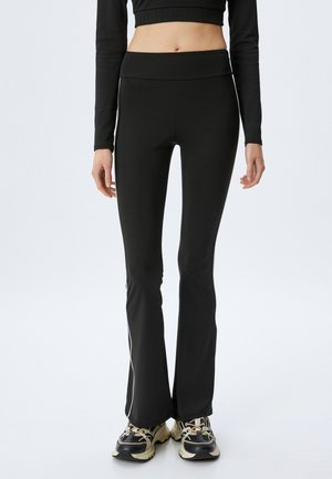 FLARE  - Leggings - Trousers - black