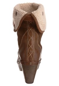 Ruskeat nahkaiset nilkkasaappaat, joissa on tekoturkisvuori, kuvioitu korko ja koristeellinen ommel sivuilla. Käännetty varsi.