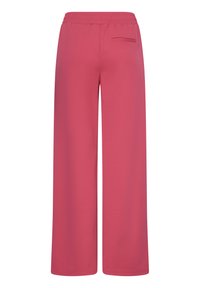 Pantalon à jambes larges de couleur rose uni avec taille élastique et une seule poche passepoilée à l'arrière, montré de dos.