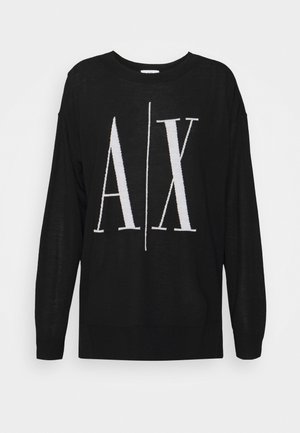 Musta pitkähihaisen neulepuseron etupuolella suuri valkoinen "A|X"-logo keskellä, pyöreä pääntie ja resoripääntie sekä helma.