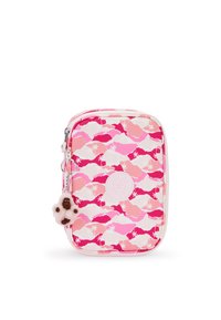 Rosa gepunktete Tasche mit einem Palmenmuster, ausgestattet mit einem flauschigen Anhänger und einem Gummiemblem. Glattes Material mit Reißverschluss.