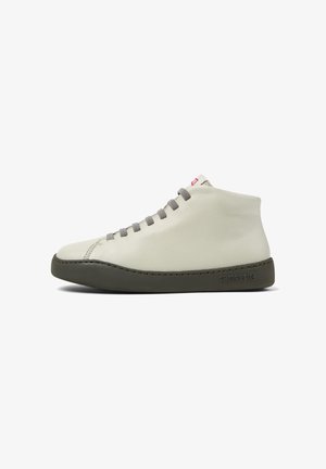 White leather high-top sneaker with gray laces, rubber sole, and contrasting stitching. Features a small red logo on the tongue.